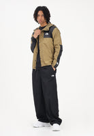 THE NORTH FACE Giacca a vento Reign On kiwi e nero da uomo NF0A5IG32EL1 . THE NORTH FACE 
