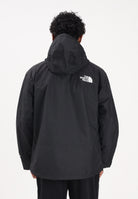 THE NORTH FACE Giacca a vento Reign On nera da uomo NF0A8B5GJK31 . THE NORTH FACE 