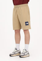 THE NORTH FACE Shorts sportivo NSE Box Light Regular beige da uomo NF0A8GQ8LK51 . THE NORTH FACE 