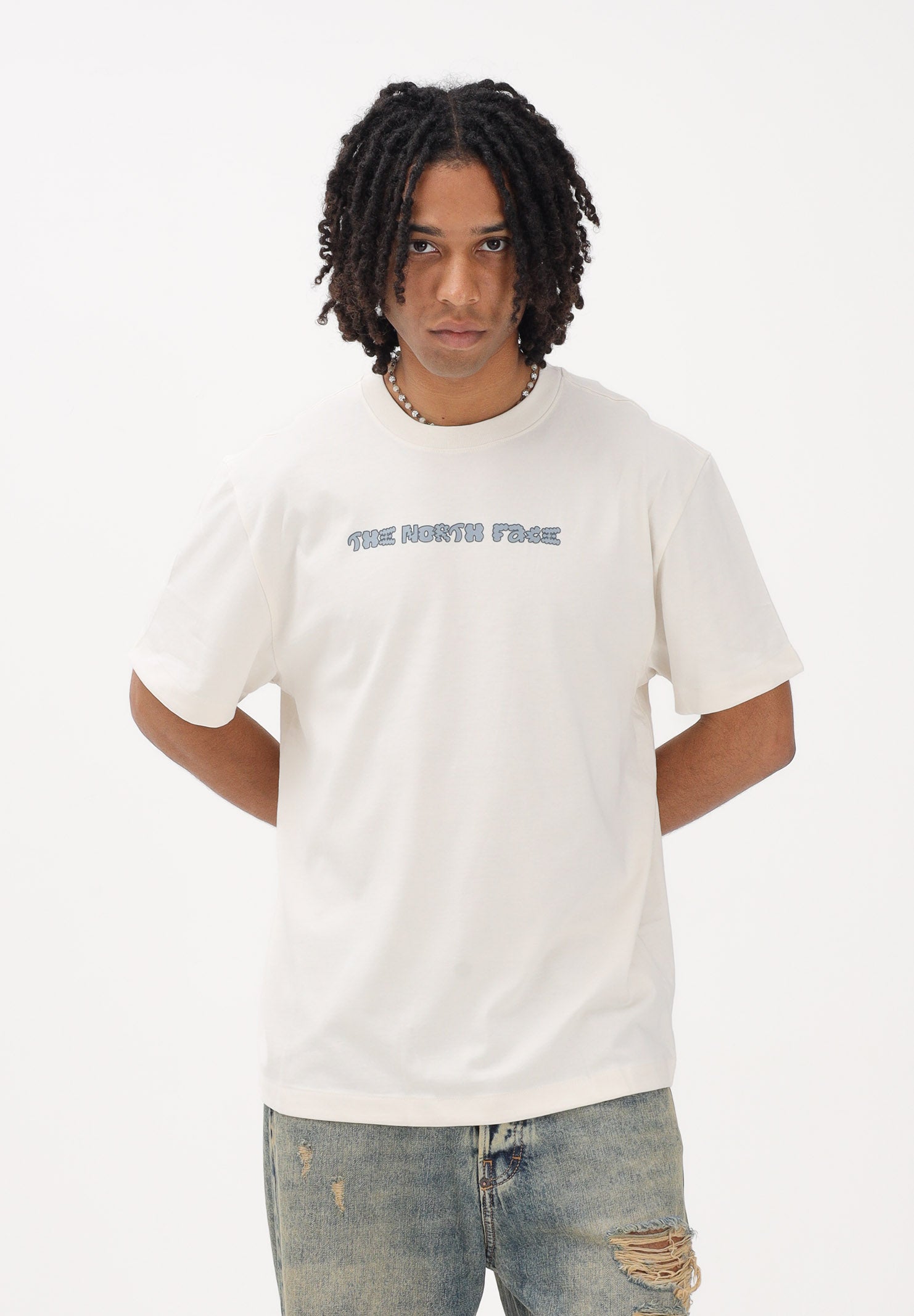 THE NORTH FACE T-shirt a manica corta Logo Twist Relaxed panna da uomo NF0A8GQVQLI1 . THE NORTH FACE 