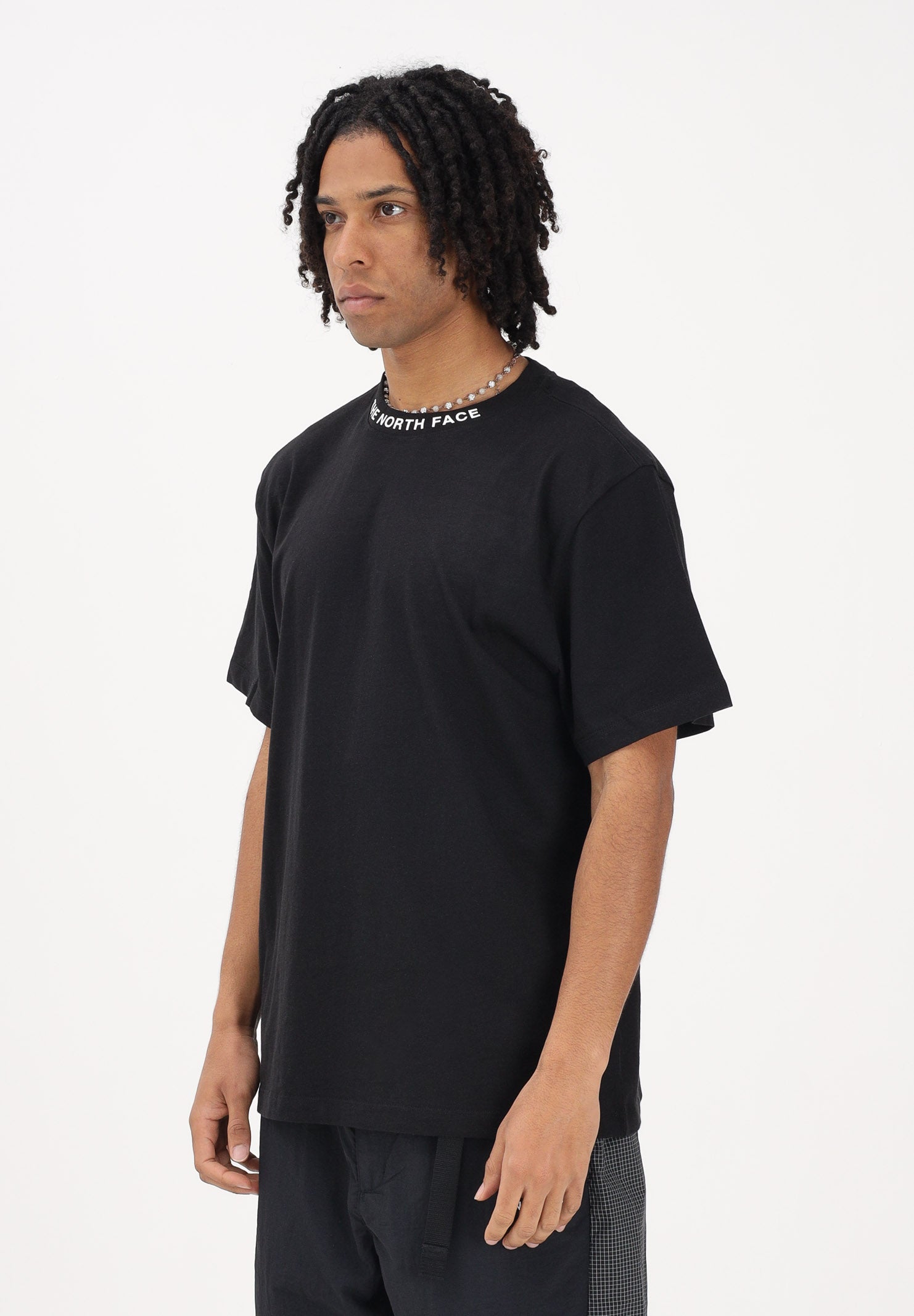 THE NORTH FACE T-shirt a manica corta Zumu Relaxed nera da uomo NF0A8GUYJK31 . THE NORTH FACE 