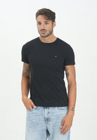 TOMMY HILFIGER T-shirt a manica corta TH Flex nera da uomo MW0MW27539BDS . TOMMY HILFIGER 
