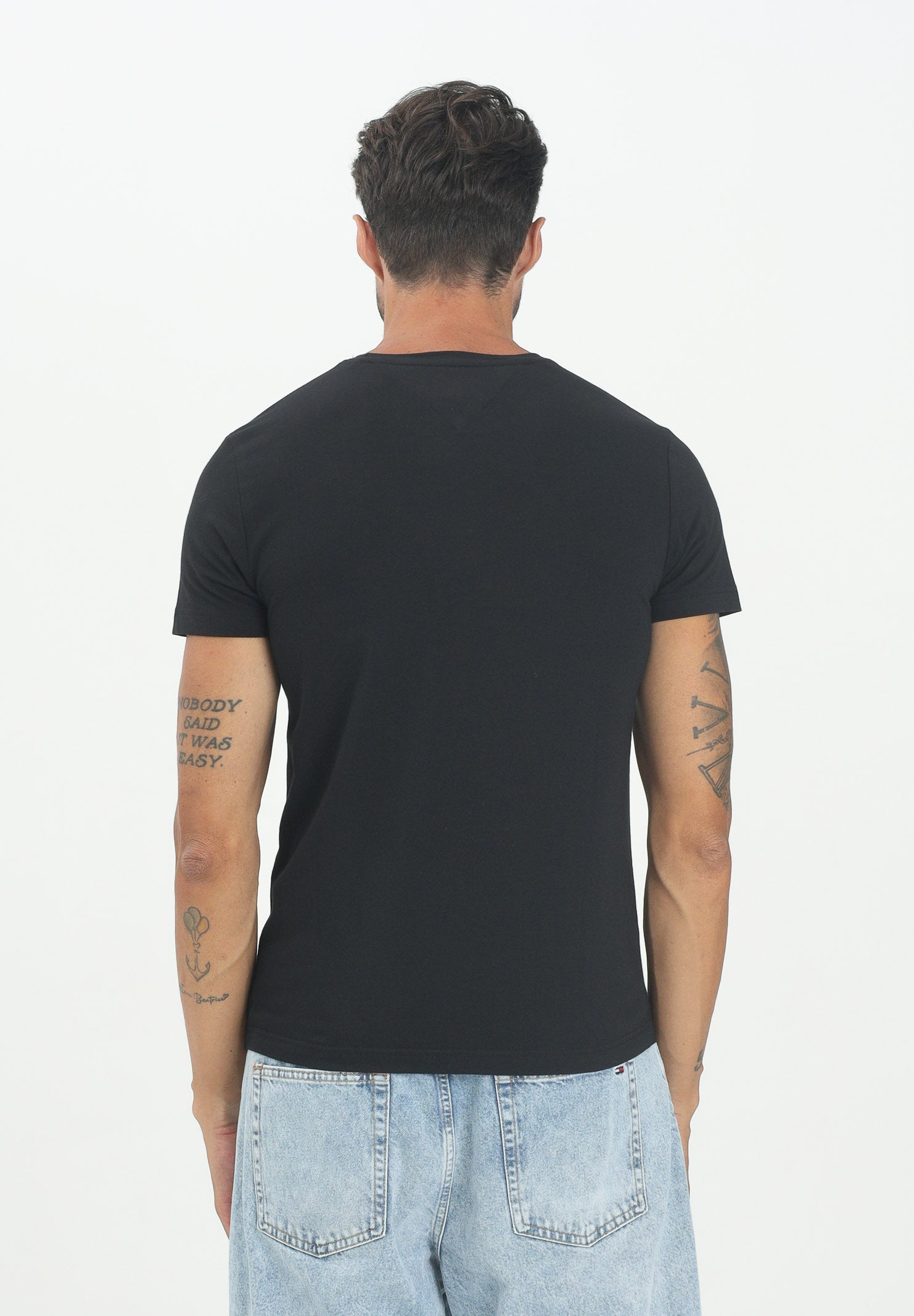 TOMMY HILFIGER T-shirt a manica corta TH Flex nera da uomo MW0MW27539BDS . TOMMY HILFIGER 