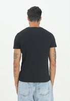 TOMMY HILFIGER T-shirt a manica corta TH Flex nera da uomo MW0MW27539BDS . TOMMY HILFIGER 