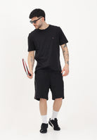 TOMMY HILFIGER Shorts sportivo nero da uomo con banda laterale logata MW0MW42883 BDS TOMMY HILFIGER 