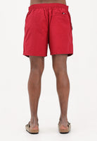 TOMMY HILFIGER Shorts mare rosso da uomo con bandiera Hilfiger UM0UM03474 XKC TOMMY HILFIGER 