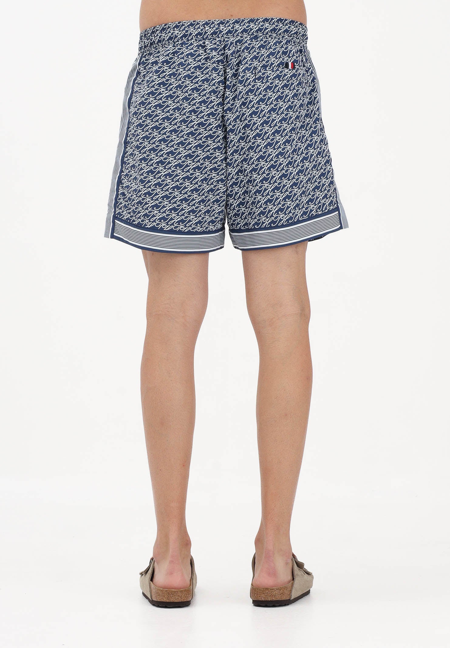 TOMMY HILFIGER Shorts mare blu da uomo con fantasia monogram UM0UM03822 0YC TOMMY HILFIGER 