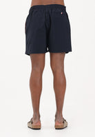 TOMMY HILFIGER Shorts mare blu da uomo con grafica color block UM0UM03840 DW5 TOMMY HILFIGER 