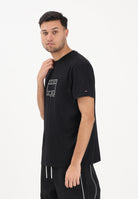 TOMMY JEANS T-shirt a manica corta nera da uomo con logo a timbro DM0DM22317 BDS TOMMY JEANS 