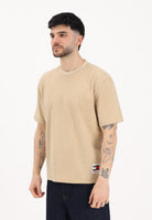 TOMMY JEANS T-shirt a manica corta beige da uomo con maxi stampa sul retro DM0DM22519 AB9 TOMMY JEANS 