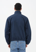 TOMMY JEANS Giacca a vento blu da uomo con logo DM0DM22720 C1G TOMMY JEANS 