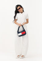 TOMMY JEANS Polo a manica corta bianca da donna con logo DW0DW20160 YBL TOMMY JEANS 