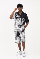 VERSACE JEANS COUTURE Shorts nero da uomo con stampa Wave Couture 80GAD10BNS787 V22 VERSACE JEANS COUTURE 