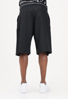 VERSACE JEANS COUTURE Shorts nero da uomo con punto vita logato 80GAD119N0645 899 VERSACE JEANS COUTURE 