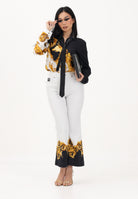 VERSACE JEANS COUTURE Jeans bianco da donna con stampa 80HAB58PES161L54 GL2 VERSACE JEANS COUTURE 