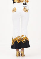 VERSACE JEANS COUTURE Jeans bianco da donna con stampa 80HAB58PES161L54 GL2 VERSACE JEANS COUTURE 