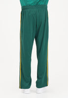 ADIDAS ORIGINALS Pantalone sportivo Firebird Loose Pinstripes verde e giallo da uomo KE3456 . ADIDAS ORIGINALS 