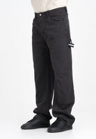 TOMMY JEANS Jeans Carpenter Jaime in denim nero da uomo DM0DM21703BDS  TOMMY JEANS 