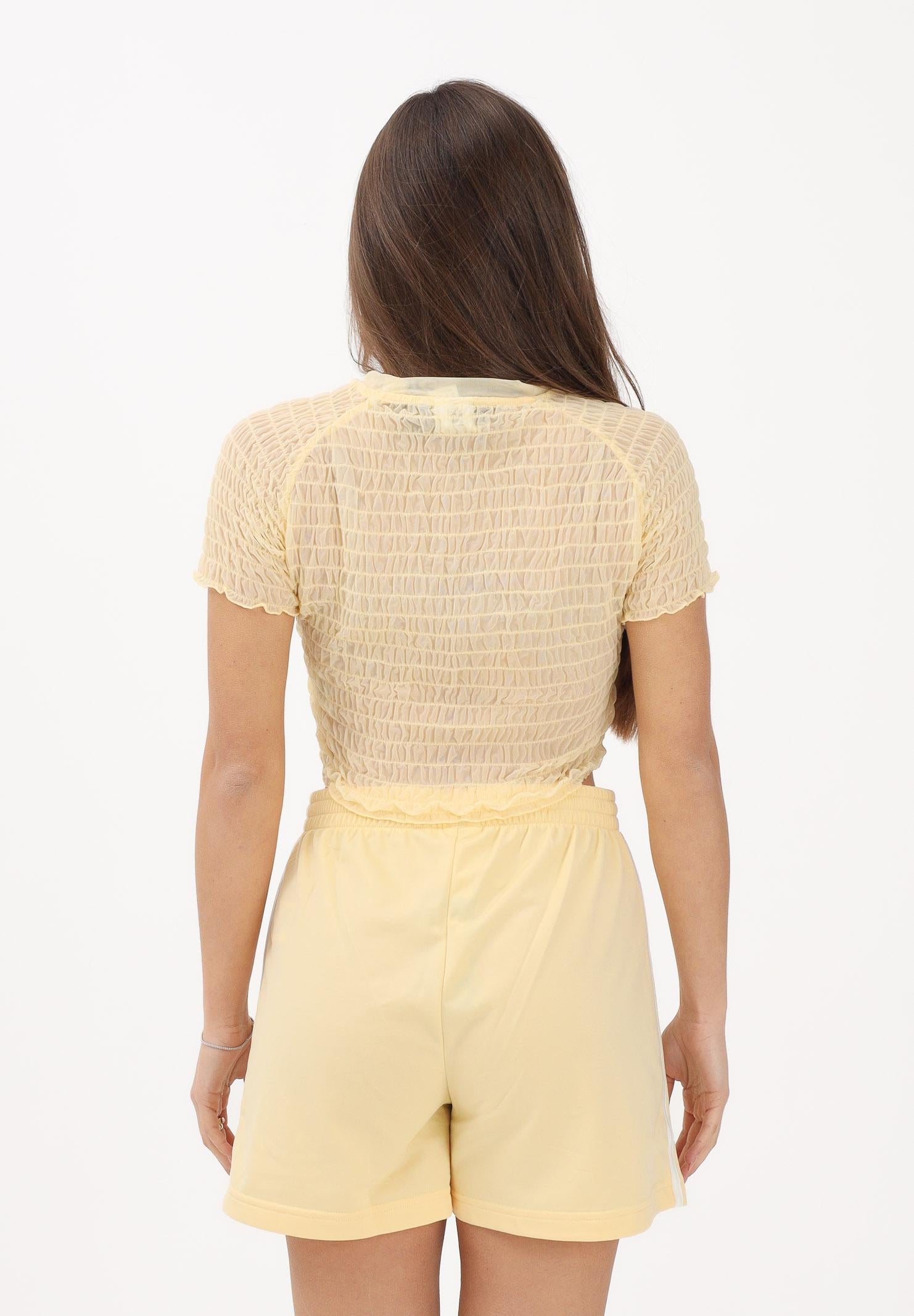 ADIDAS ORIGINALS T-shirt a manica corta SMOCKED CALI gialla da donna KE3431 . ADIDAS ORIGINALS 