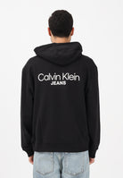 CALVIN KLEIN JEANS Felpa con cappuccio nera da uomo con stampa logo LV04RD002GUB1 . CALVIN KLEIN JEANS 