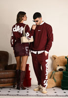 DISCLAIMER Pantalone sportivo bordeaux da uomo con maxi stampa logo 25IDS55101 BO DISCLAIMER 