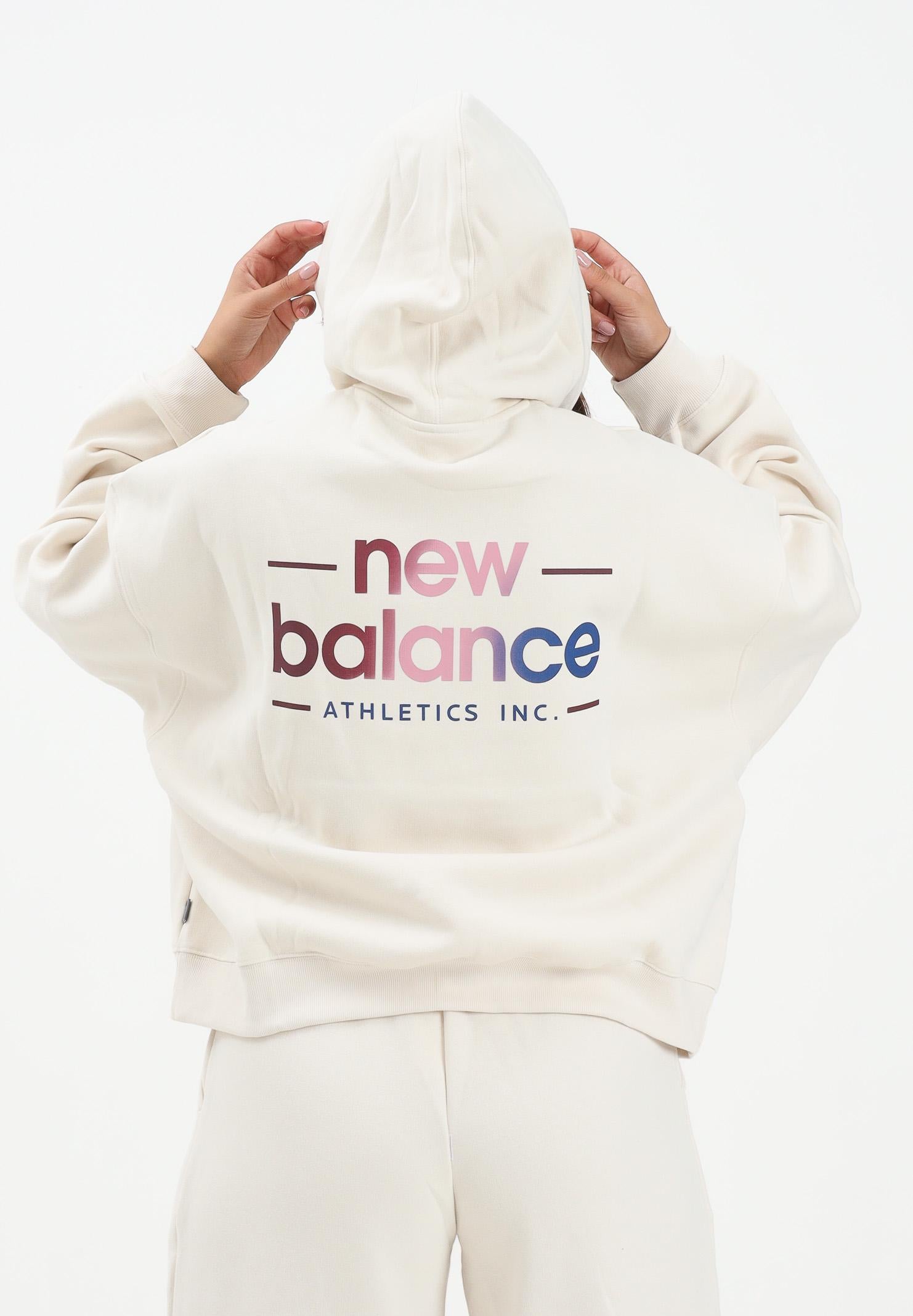 NEW BALANCE Felpa con cappuccio panna da donna rifinita da stampa logo WT53515LIN . NEW BALANCE 