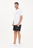 ADIDAS PERFORMANCE Shorts ESSENTIALS BASE WOVEN nero da uomo KA3549 . ADIDAS PERFORMANCE 