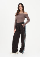 ADIDAS ORIGINALS Pantalone sportivo Firebird Loose marrone e azzurro da donna KT4627 . ADIDAS ORIGINALS 