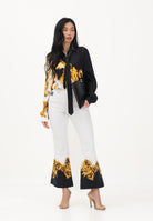 VERSACE JEANS COUTURE Jeans bianco da donna con stampa 80HAB58PES161L54 GL2 VERSACE JEANS COUTURE 