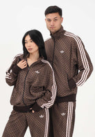 ADIDAS ORIGINALS Felpa con zip Firebird Loose Monogram marrone e rosa per uomo e donna KE1677 . ADIDAS ORIGINALS 