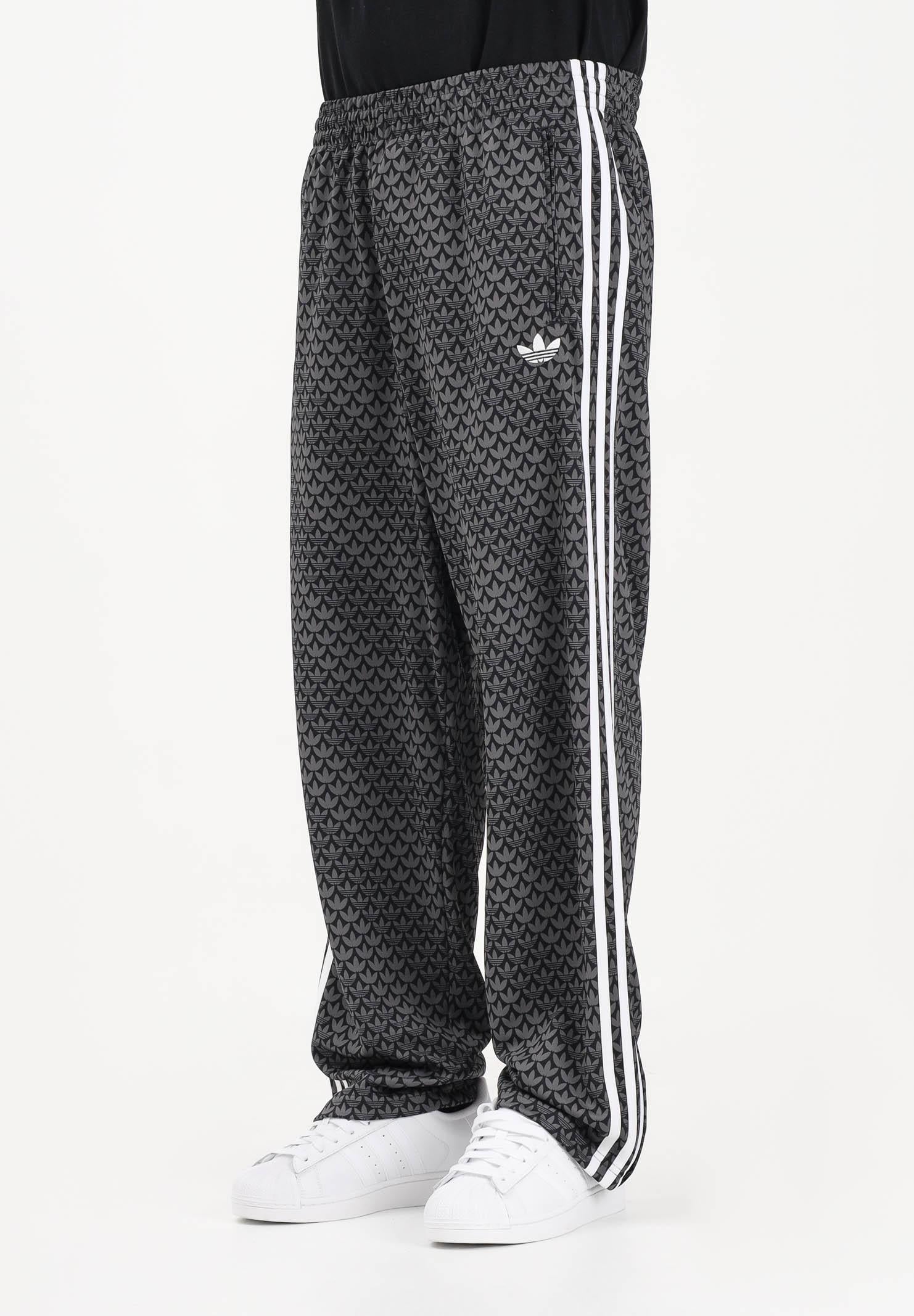 ADIDAS ORIGINALS Pantalone sportivo FIREBIRD LOOSE MONOGRAM nero da uomo KC9159 . ADIDAS ORIGINALS 