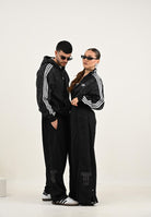 ADIDAS ORIGINALS Felpa con zip Firebird Loose Leo nera da uomo JV7579  ADIDAS ORIGINALS 