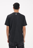 ADIDAS ORIGINALS T-shirt a manica corta Archive Anime Football nera da uomo KE2768 . ADIDAS ORIGINALS 