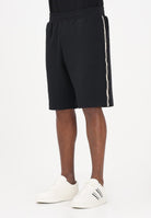 EA7 Shorts sportivo nero da uomo con bande logate laterali 7M001481AF12660 UC001 EA7 