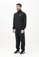 PUMA Tuta nera da uomo con piping intrecciato 684849 01 PUMA 