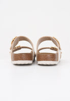 BIRKENSTOCK Ciabatte Sydney Cushion Buckle crema da donna 1030258 . BIRKENSTOCK 