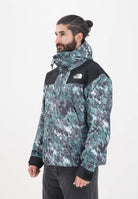 THE NORTH FACE Giacca a vento DryVent™ Mono Mountain da uomo con fantasia verde e nera NF0A88XF87A1 . THE NORTH FACE 