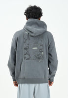 THE NORTH FACE Felpa con cappuccio Powder Days Relaxed Graphic grigia da uomo NF0A8E4G0C51 . THE NORTH FACE 