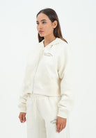 NEW BALANCE felpa con zip panna da donna con interno felpato WJ53509PEF . NEW BALANCE 