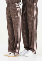 ADIDAS ORIGINALS Pantalone sportivo FIREBIRD LOOSE MONOGRAM marrone per uomo e donna KE1678 . ADIDAS ORIGINALS 