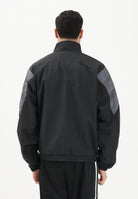 ADIDAS ORIGINALS Giacca a vento SANTIAGO nera e grigia da uomo KS8326 . ADIDAS ORIGINALS 