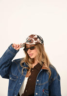 NEW ERA Cappello con visiera Animal Print 9Twenty New York Yankees con fantasia mucca nei toni del panna, marrone e nero per uomo e donna 60844104 . NEW ERA 