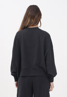 PUMA Felpa girocollo WARDROBE Essentials Oversized Crew nera da donna 629748 01 PUMA 