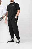 Pantalone sportivo nero per uomo e donna con patch logo XH2750 031 LACOSTE 