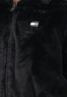 TOMMY JEANS Pelliccia sintetica nera da donna con logo DW0DW21669BDS  TOMMY JEANS 