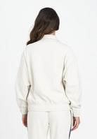 PUMA Felpa con zip T7 panna da donna 632137 87 PUMA 