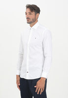 TOMMY HILFIGER Camicia a manica lunga bianca da uomo con logo MW0MW38347YCF  TOMMY HILFIGER 