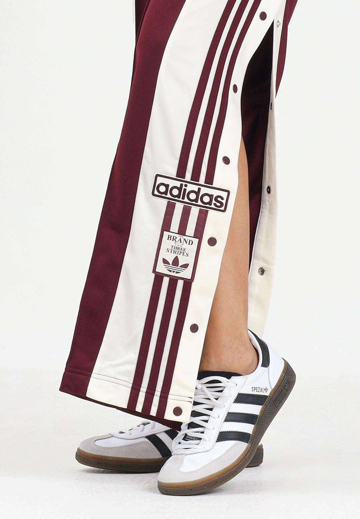 ADIDAS ORIGINALS Pantalone sportivo Adibreak bordeaux da donna KA7732 . ADIDAS ORIGINALS 