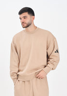 ADIDAS PERFORMANCE Felpa girocollo Essentials Loose Fit 3 Bar Logo beige da uomo JX5668 . ADIDAS PERFORMANCE 