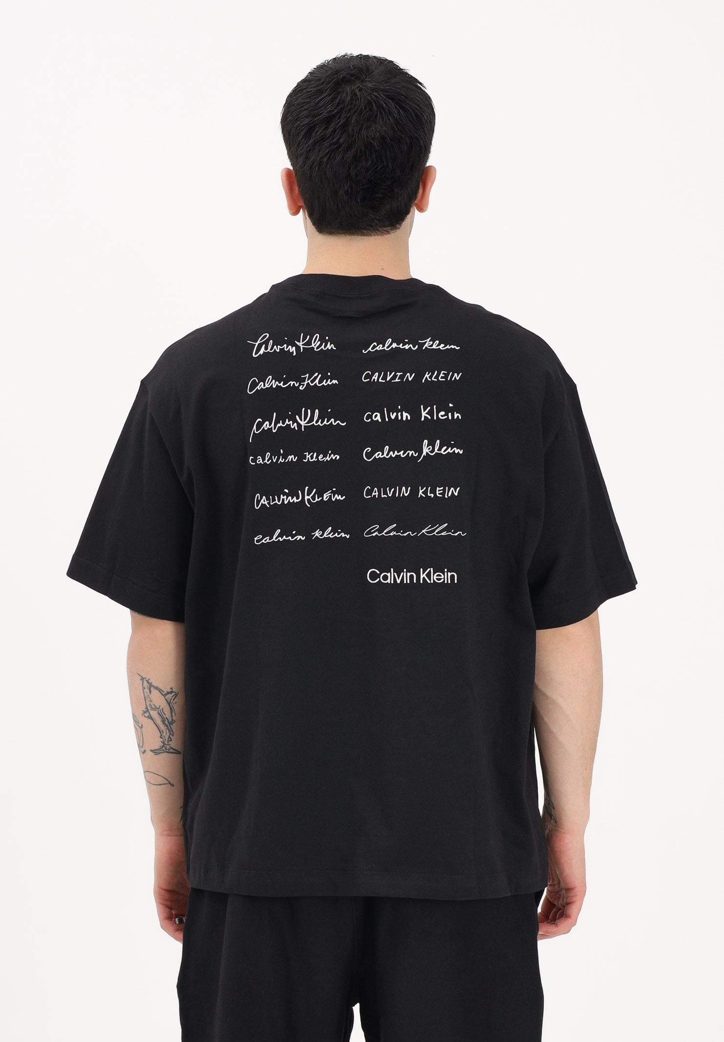 CALVIN KLEIN JEANS T-shirt a manica corta nera da uomo con logo frontale e stampa sul retro LV04RE828G UB1 CALVIN KLEIN JEANS 